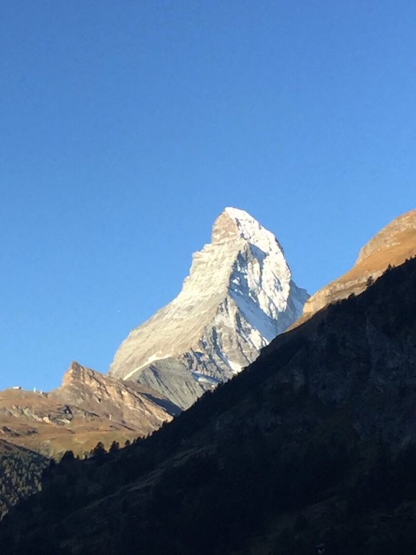 The Matterhorn above Zermatt against a clear blue sky
